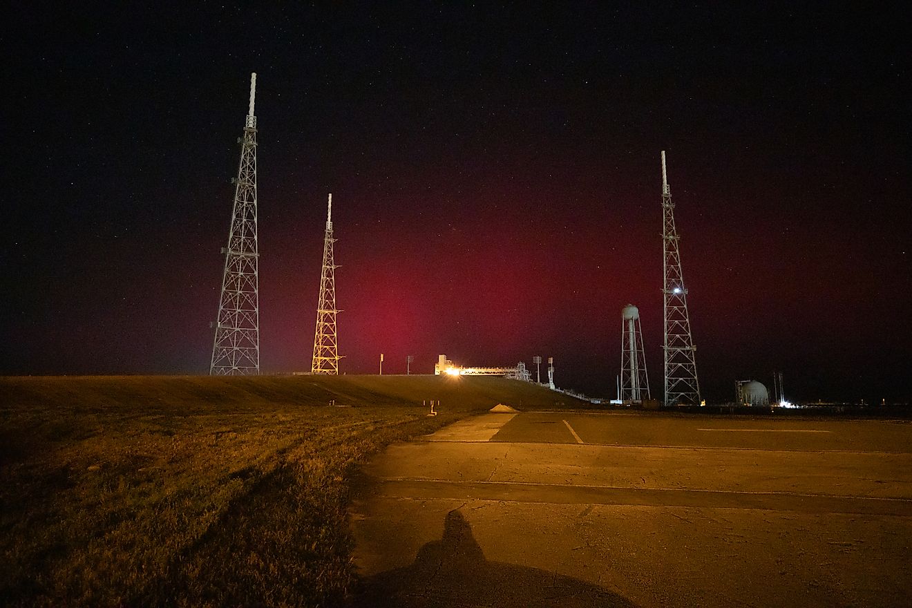 The faint glow of an aurora is seen over Launch Complex 39B at NASA’s Kennedy Space Center in Florida on Tuesday, Nov. 11, 2025. Public Domain via Wikimedia Commons