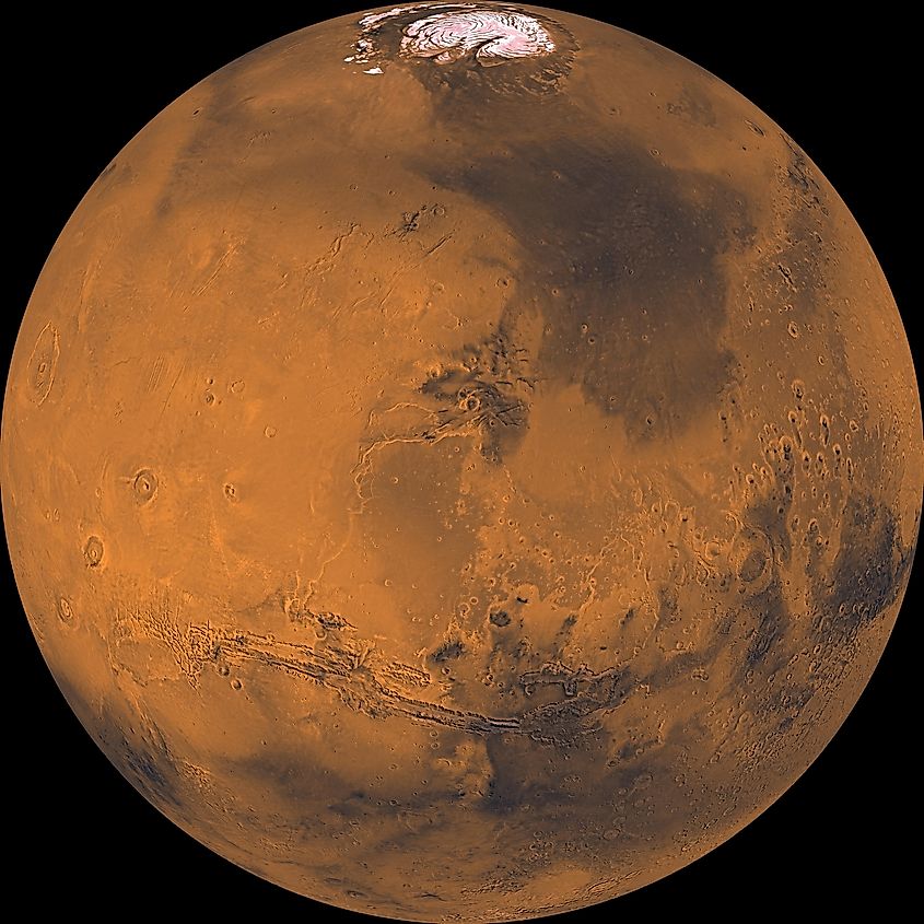 The planet Mars against the darkness of space.