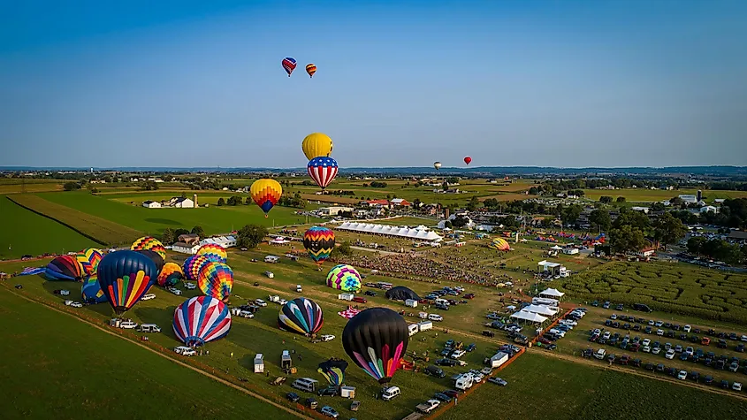 Hot air balloons float due to the relative density of the heated air within, Greg Kelton / Shutterstock.com