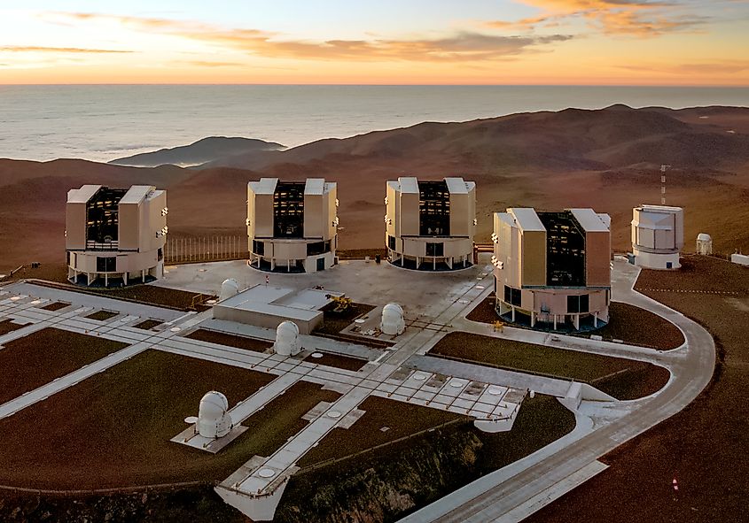 The four Unit Telescopes that form the VLT together with the four Auxiliary Telescopes (VST at right).