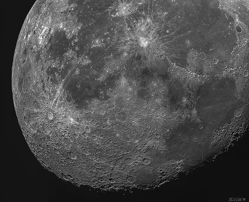 The heavily cratered surface of the Moon.