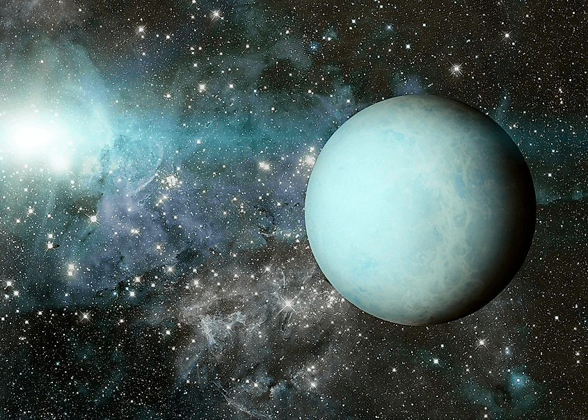 The pale blue-green disk of Uranus.