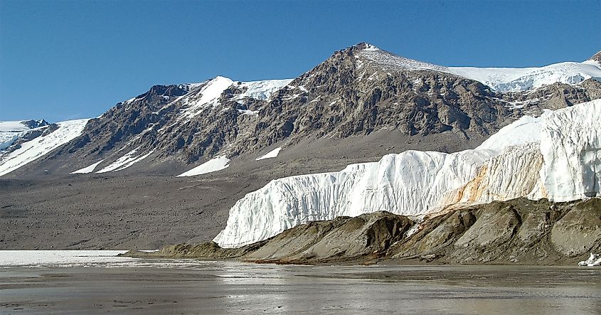Blood Falls at the snout of the Taylor Glacier, overlooking Lake Bonney, Antarctica. By Peter West, National Science Foundation - https://www.nsf.gov/news/mmg/mmg_disp.jsp?med_id=66356&from=, Public Domain, https://commons.wikimedia.org/w/index.php?curid=97561209