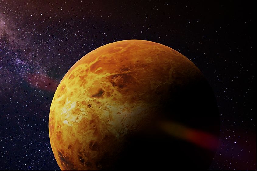 Venus seen as a featureless disc beneath its dense carbon dioxide and sulfuric acid cloud deck.