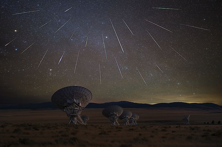 The Geminid Meteor shower taking place above the Very Large Array in New Mexico. Via Shutterstock / Liang Li Photos.