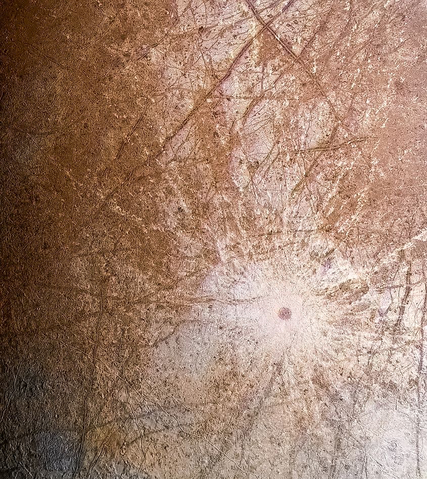Close-up of Europa's Pwyll Crater. Kevin Gill from Los Angeles, CA, United States, CC BY 2.0 via Wikimedia Commons https://creativecommons.org/licenses/by/2.0/deed.en