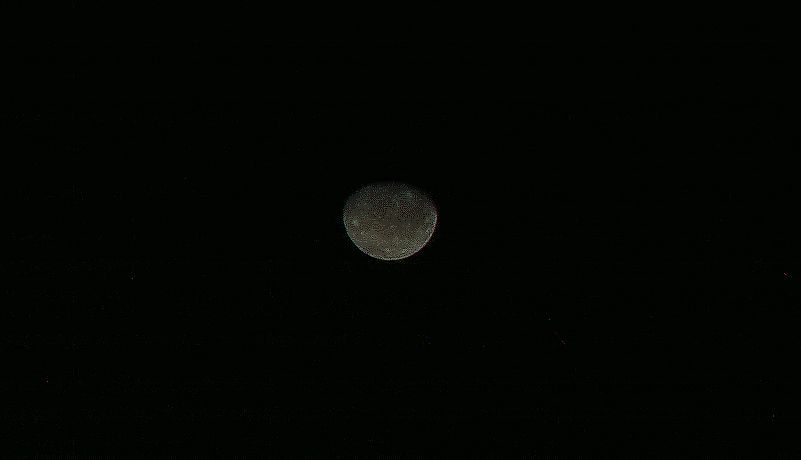 A distant photo of Callisto. Kevin M. Gill, Public domain, via Wikimedia Commons