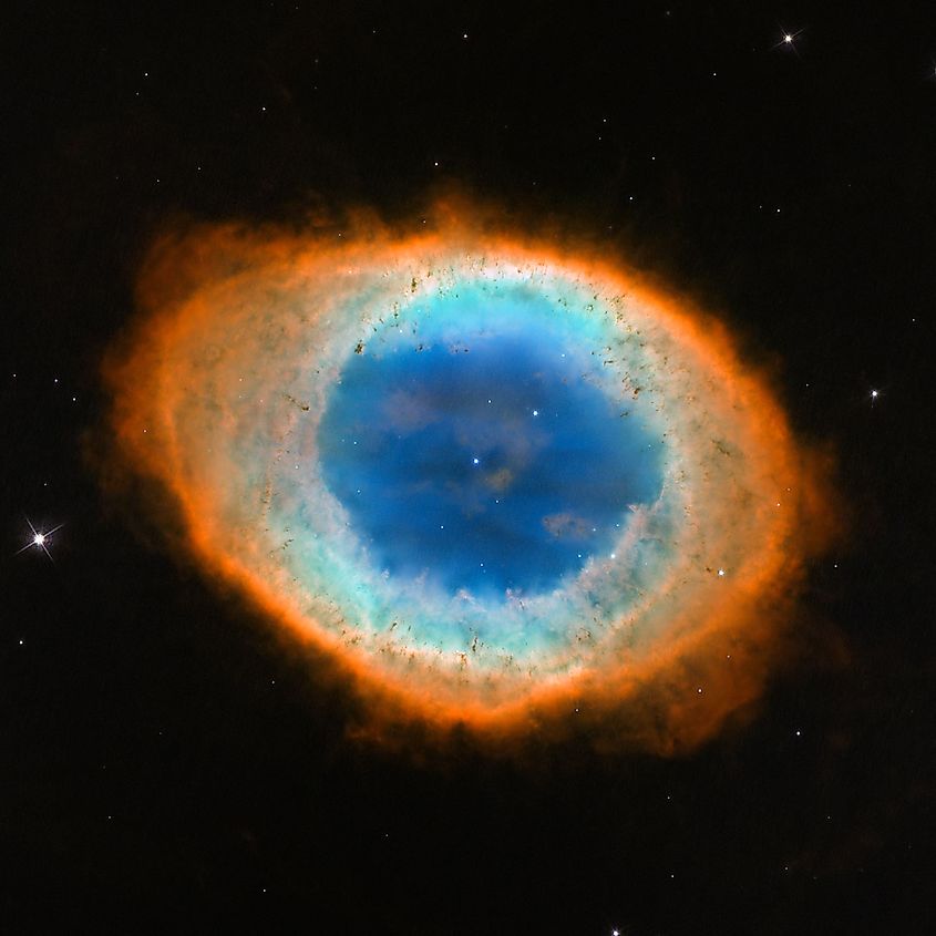 The Ring Nebula, a glowing shell of gas cast off by a dying sun-like star