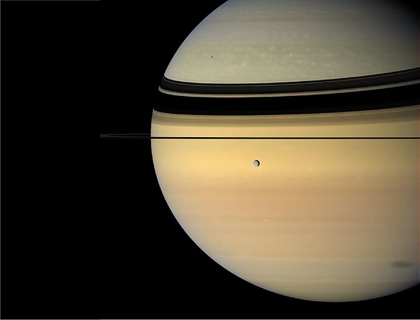 Saturn and its ring system photographed from an angle above the ring plane.