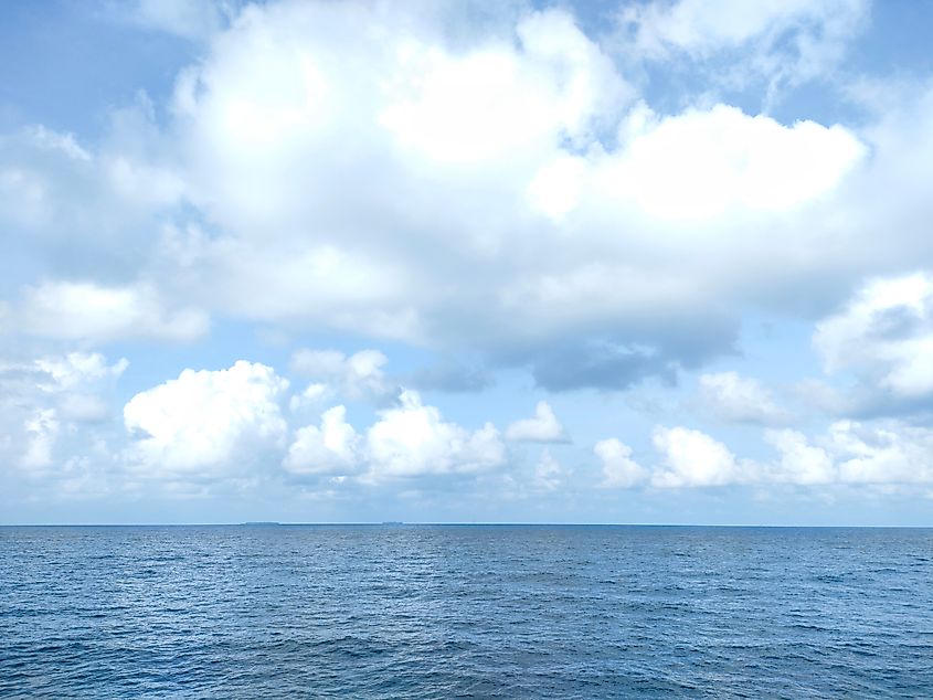 View of clouds in the middle of the sea (Aribio3 via Shutterstock)