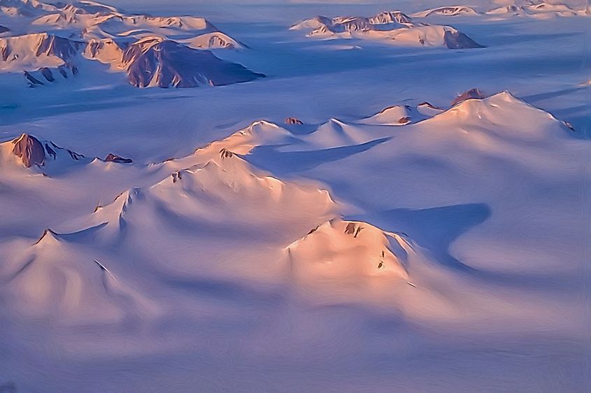 Aerial view of ice and snow cap on Ellesmere Island in Canadian High Arctic. Via Shutterstock / outdoorsman