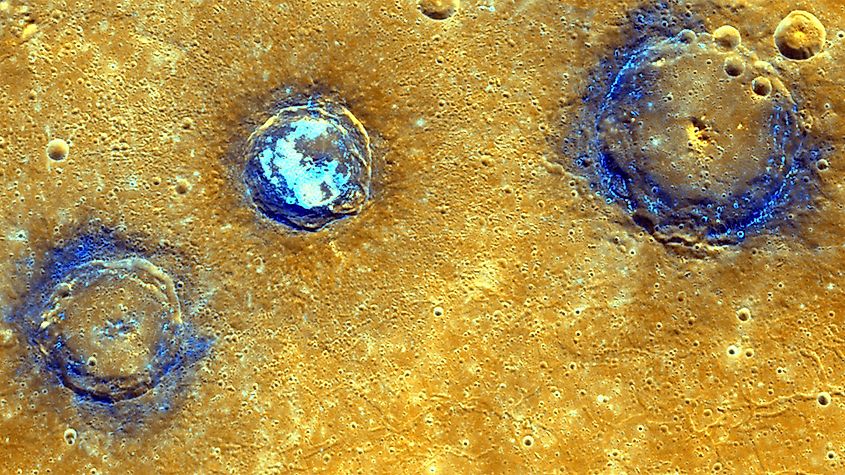 Enhanced-color image of craters of Mercury.