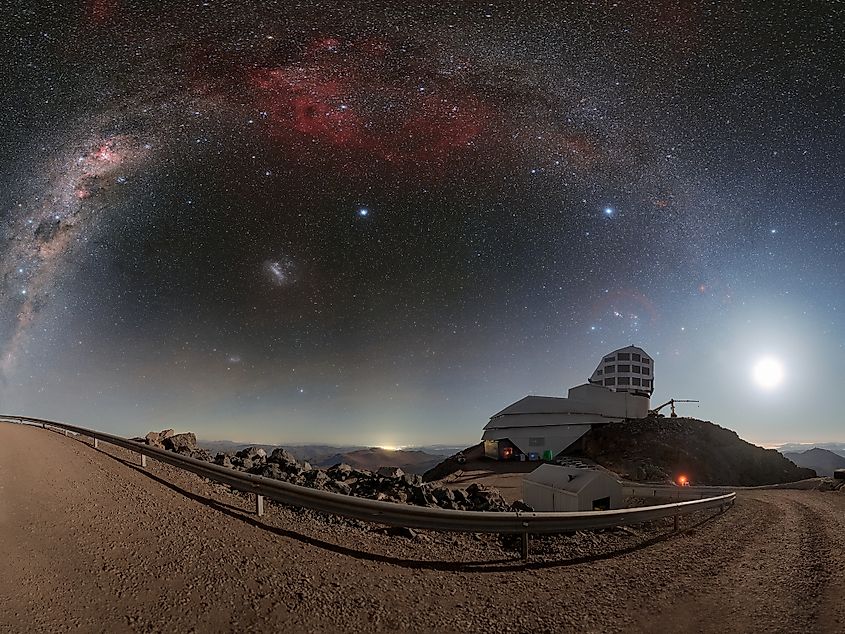 The Moon and Milky Way rise over the Vera C. Rubin Observatory in Chile, where Rubin will repeatedly scan the southern sky.