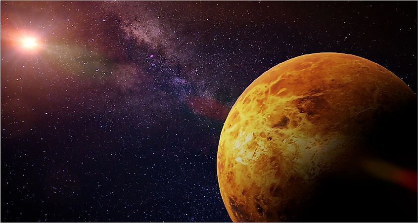 The cloud-covered planet Venus against the darkness of space.