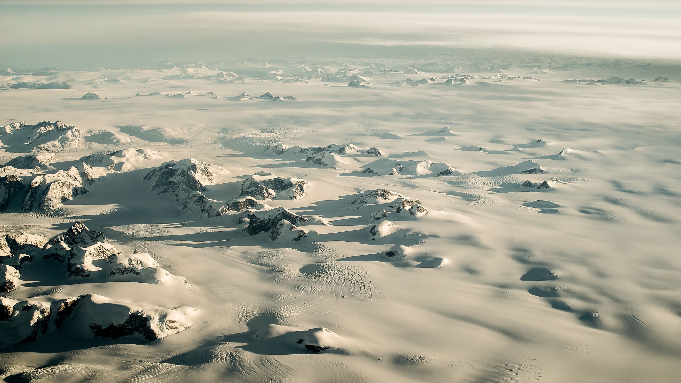 Most of Greenland's landscape is dominated by ice and snow for much of the year. Via Shutterstock / cvrestan